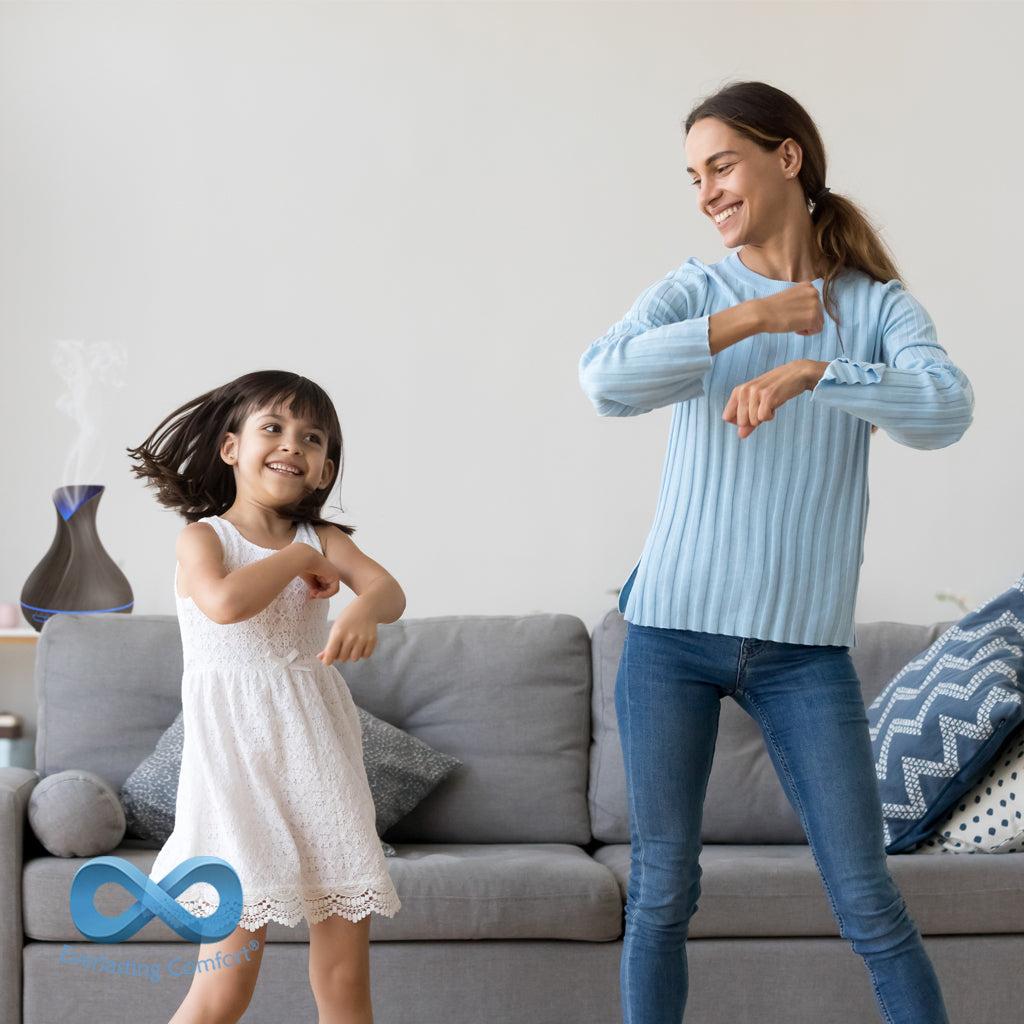 mom and daughter are dancing