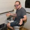 Cool Teacher Sits on Toilet Backwards