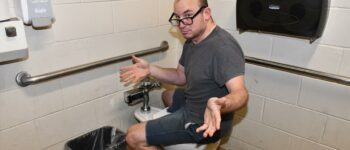 Cool Teacher Sits on Toilet Backwards