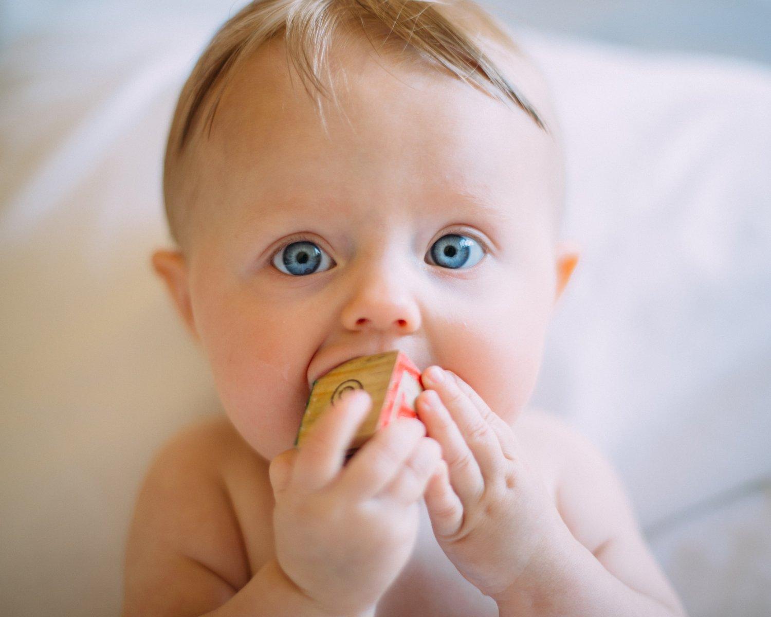 baby tilting head to one side teething