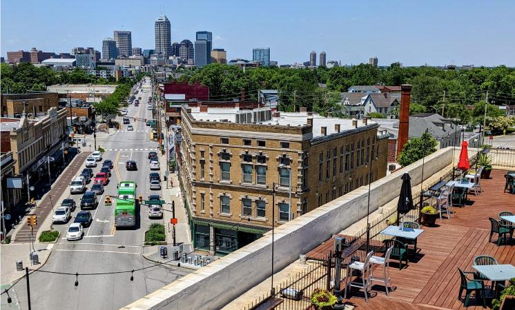 Distant view of Downtown Indianapolis from the rooftop garden at the Fountain Square Theatre Building in the historic Fountain Square neighborhood.